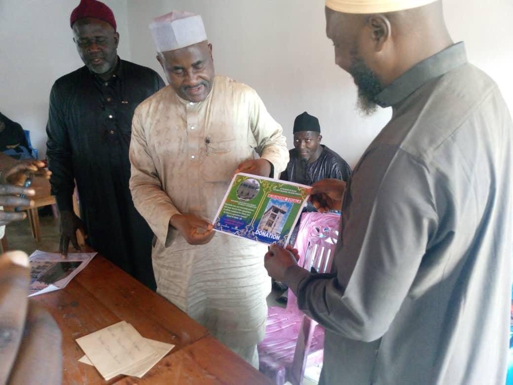 NICDA officials at a community handover